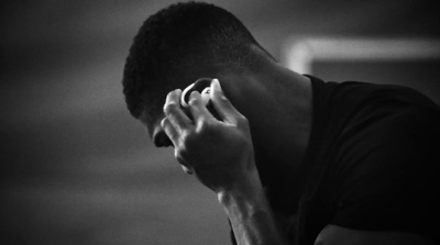 a man holding a cell phone to his ear