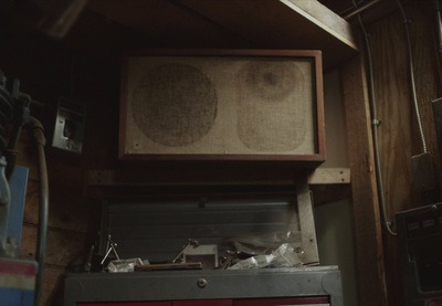 a kitchen with a stove and a microwave inside of it