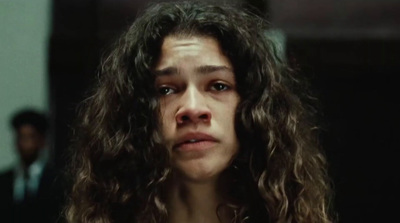 a close up of a person with long hair