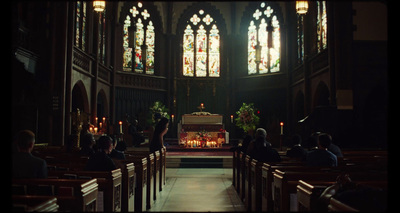 a church filled with pews and stained glass windows