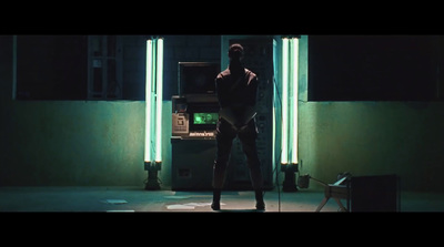 a man standing in front of a vending machine