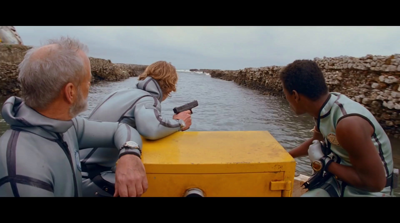 a couple of people on a boat in the water