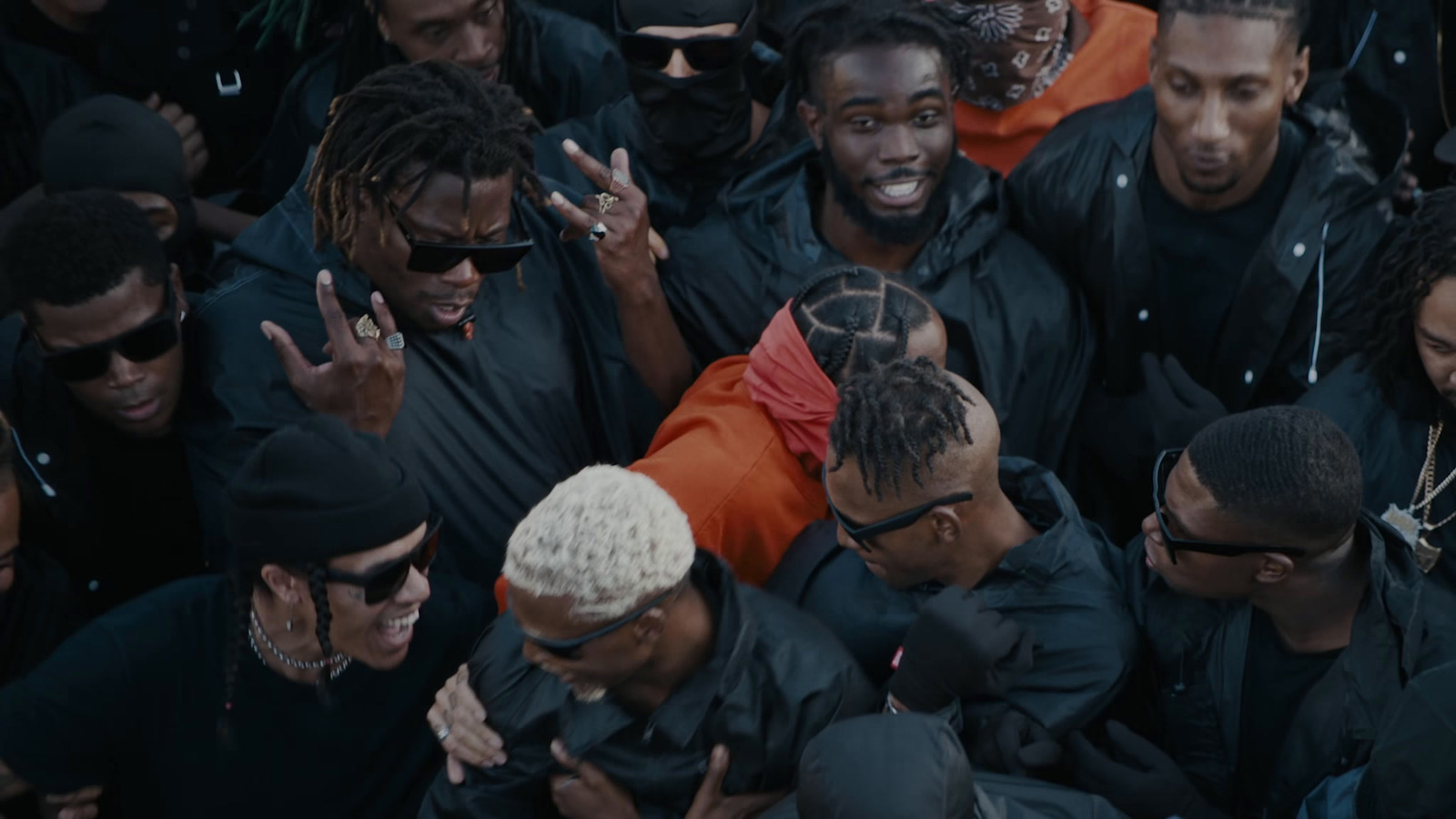 a group of men standing next to each other