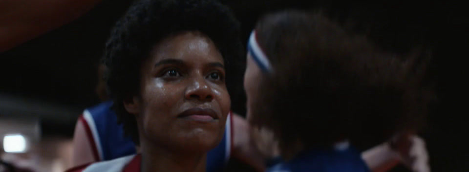 a close up of a basketball player talking to another player