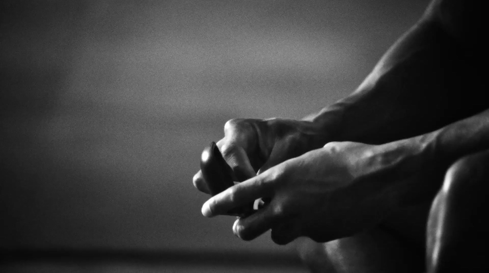 a black and white photo of a person's hands