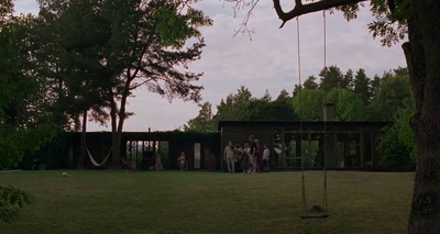 a group of people standing around a tree