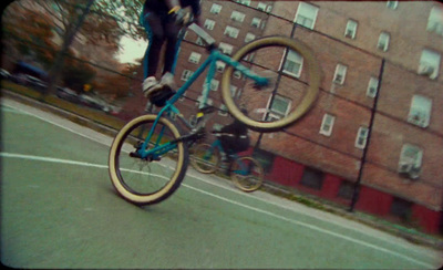 a person on a bike doing a trick in the air