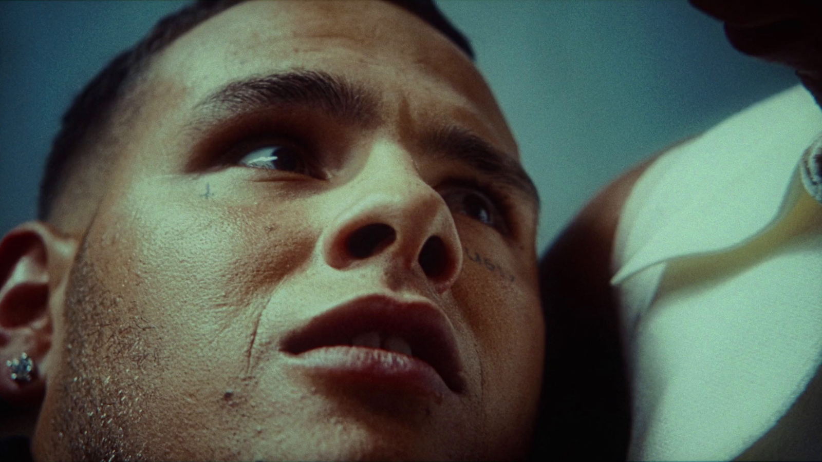 a close up of a man with a watch on his wrist