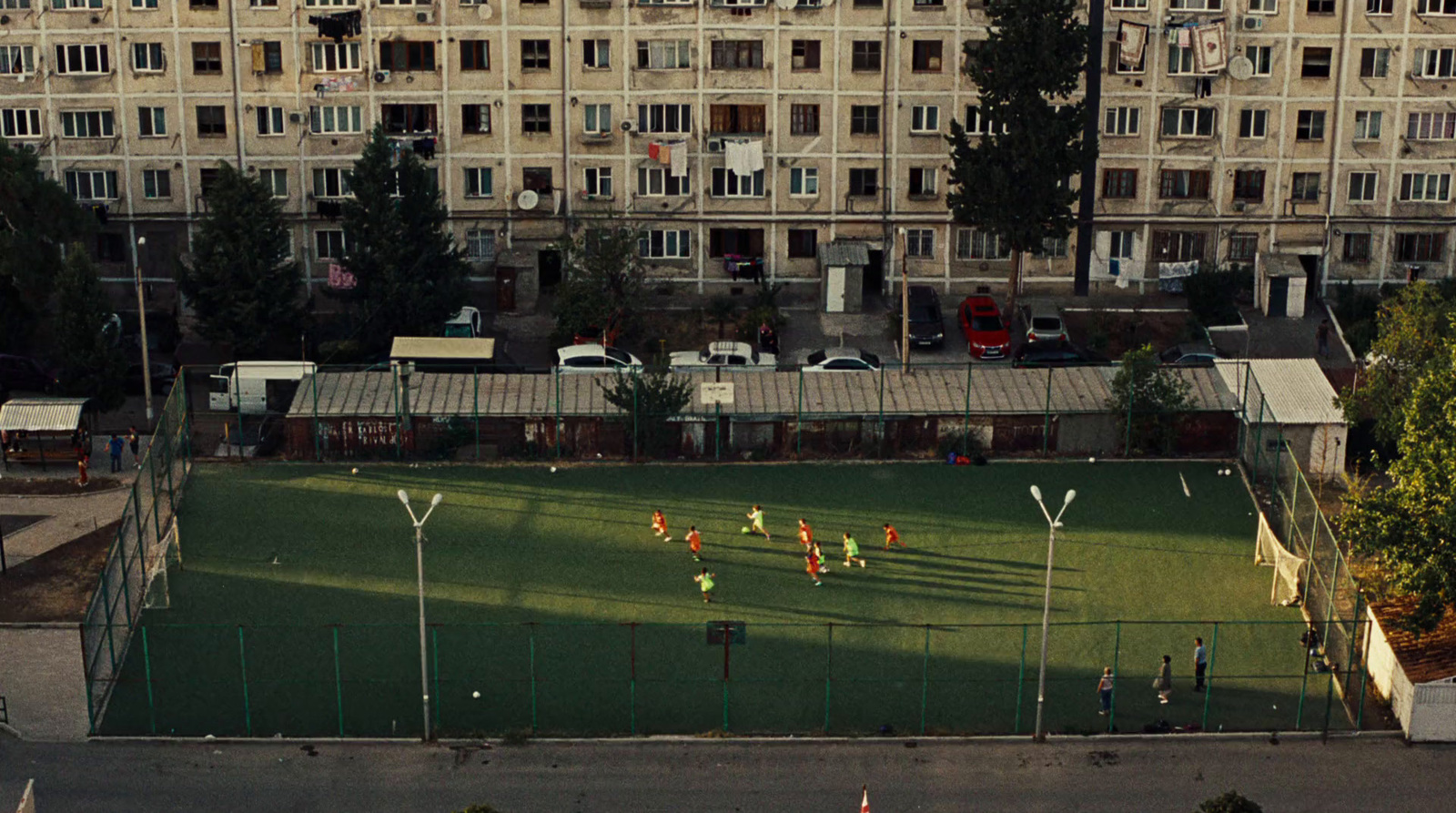 a group of people playing a game of soccer