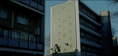 a tall building with a clock on the side of it