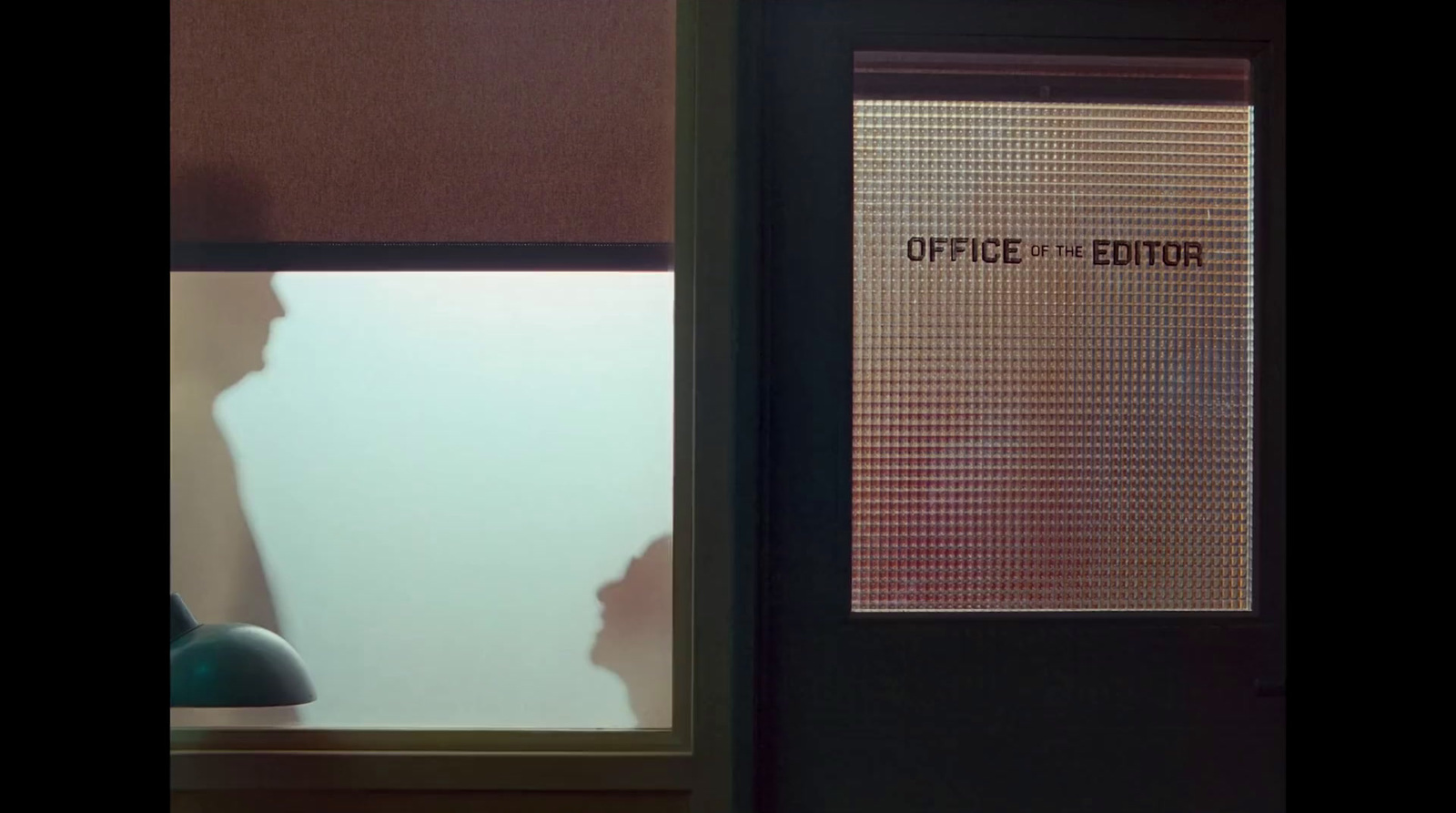 a door with a sign on it that says office of the editor
