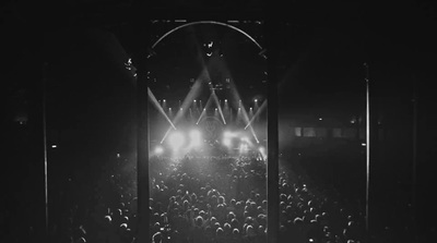 a black and white photo of a concert