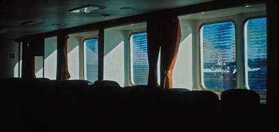 a row of seats in front of a window