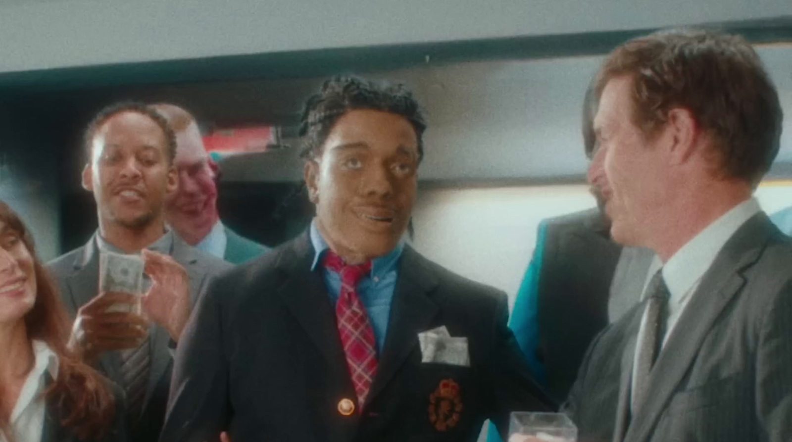 a group of people standing around each other