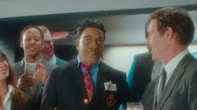 a group of people standing around each other