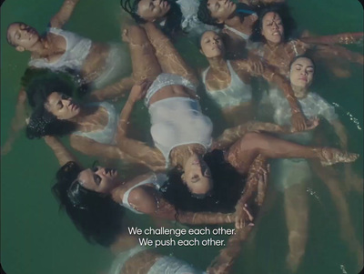 a group of women floating in a pool of water