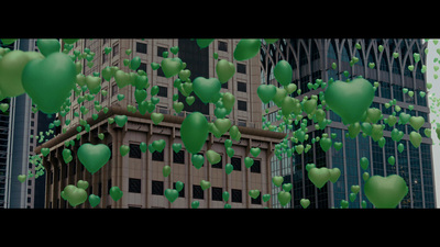 a bunch of green balloons floating in the air