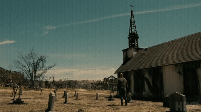 a man standing in front of a church