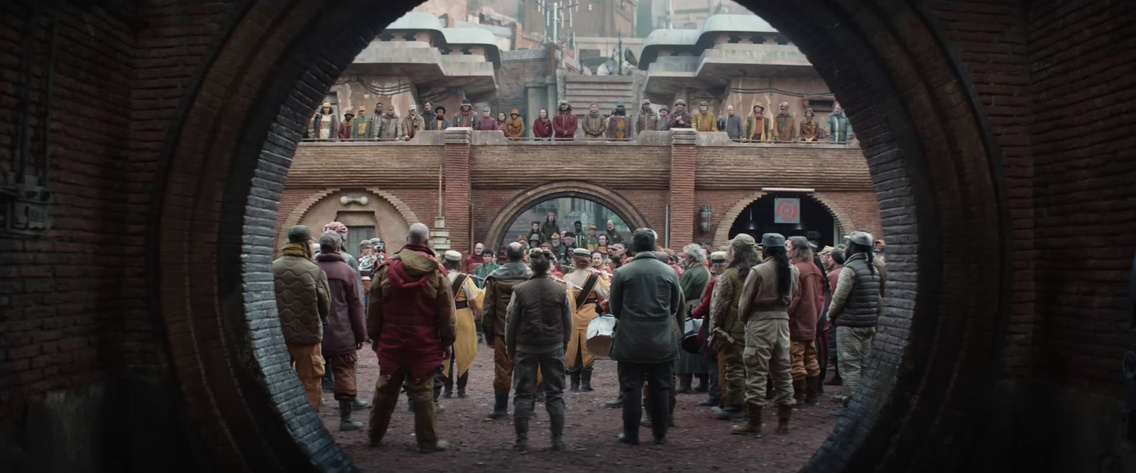 a group of people standing in front of a building