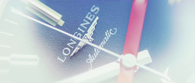 a close up of a compass with a blurry background