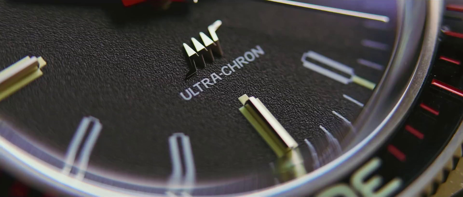 a close up of a watch with a red second hand