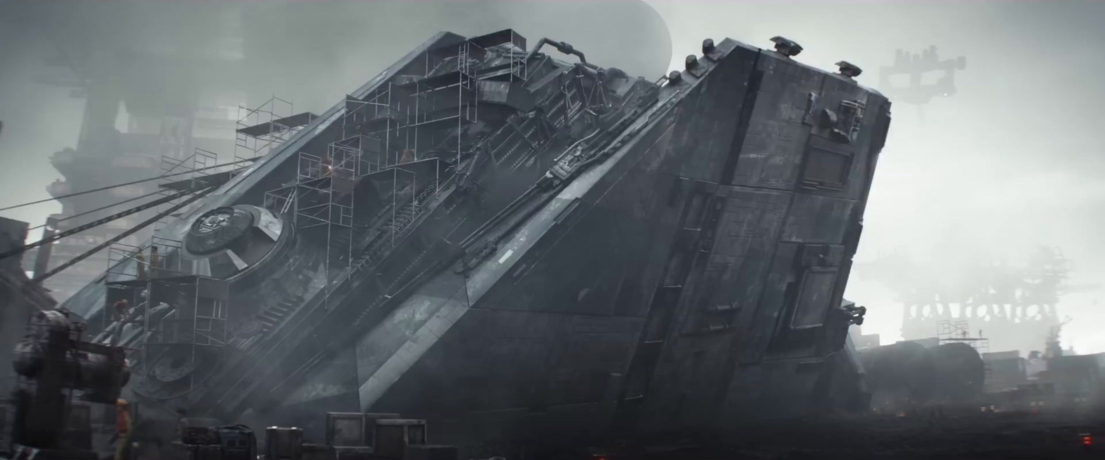 a large ship sitting on top of a pile of rubble