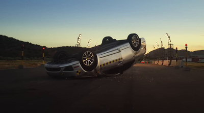 a car that is upside down on its side