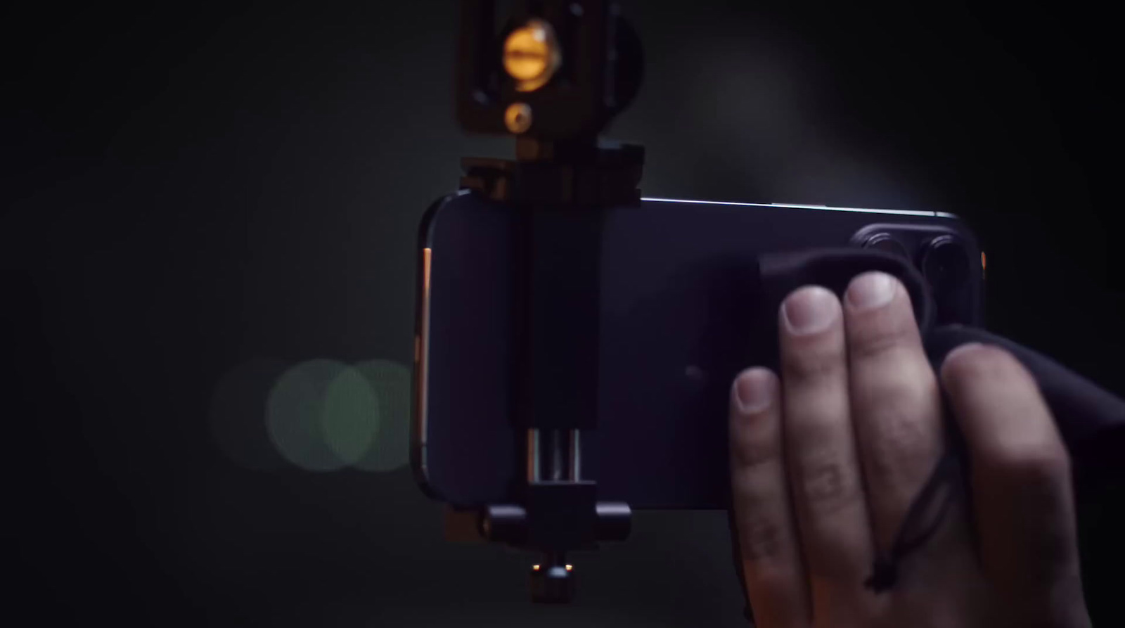 a person holding a cell phone up to a camera