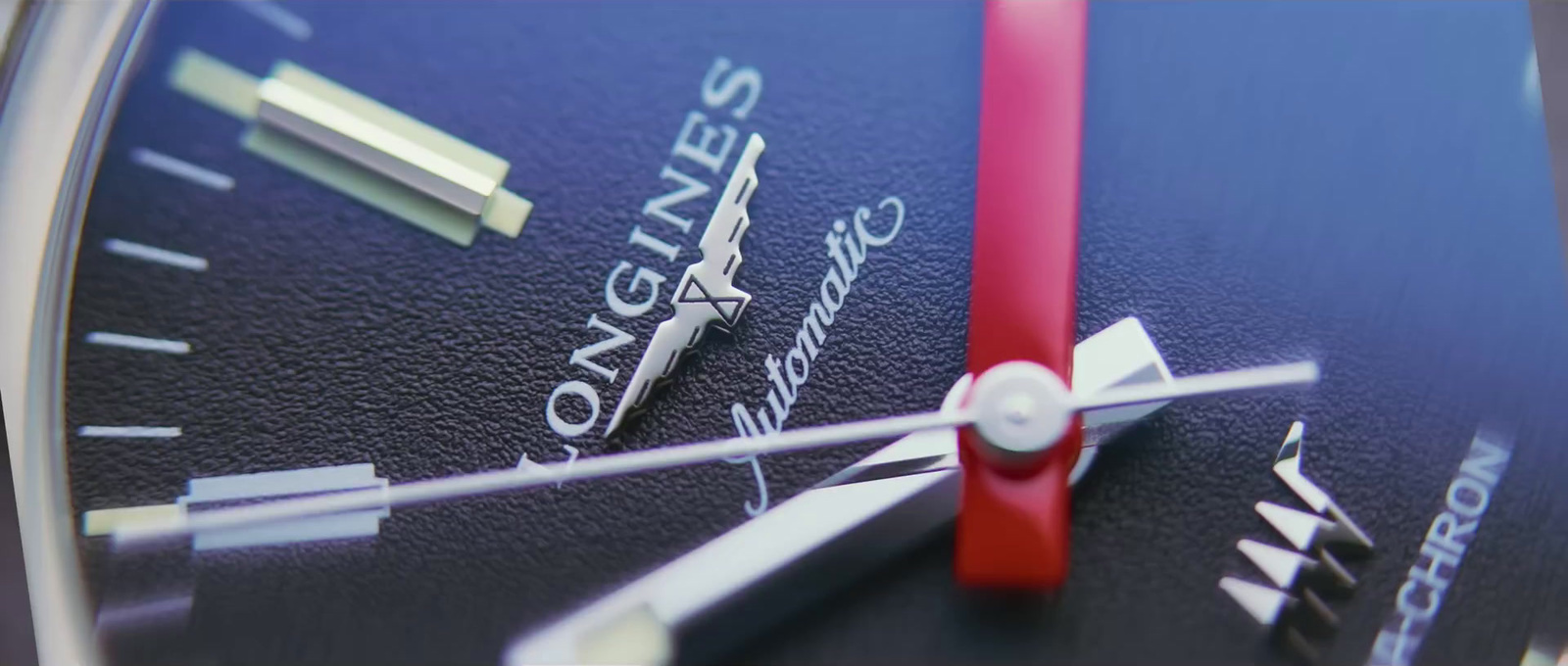 a close up of a wrist watch with a red second hand