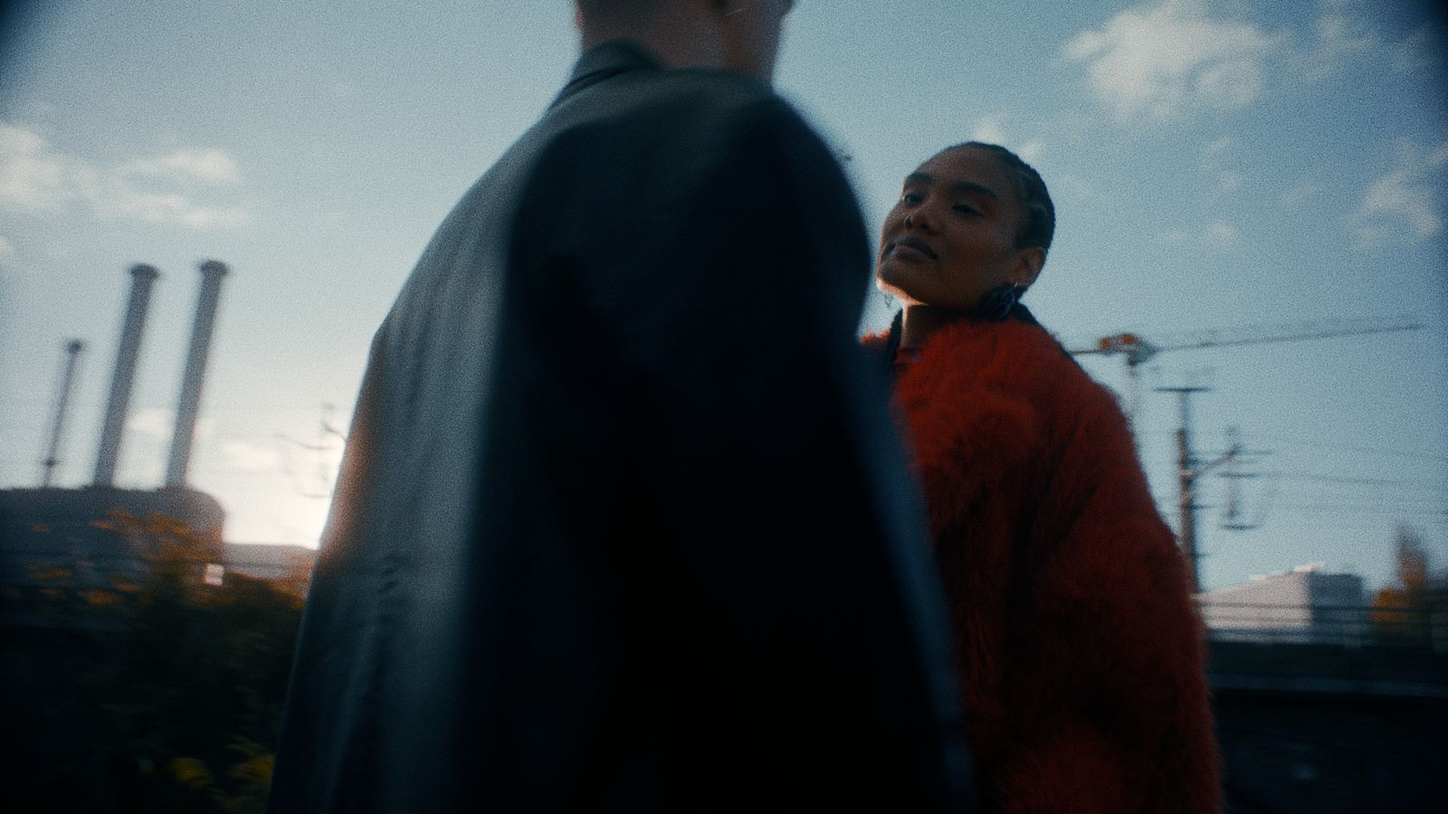 a man and a woman standing next to each other