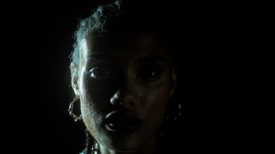 a woman with her mouth open in the dark