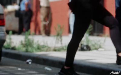 a person riding a skateboard on a city street