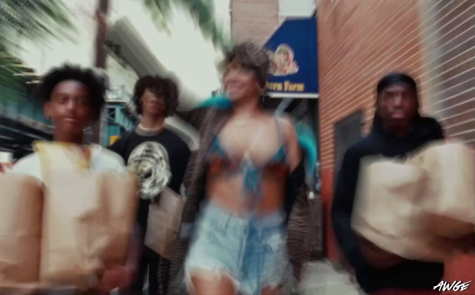 a group of young people walking down a street