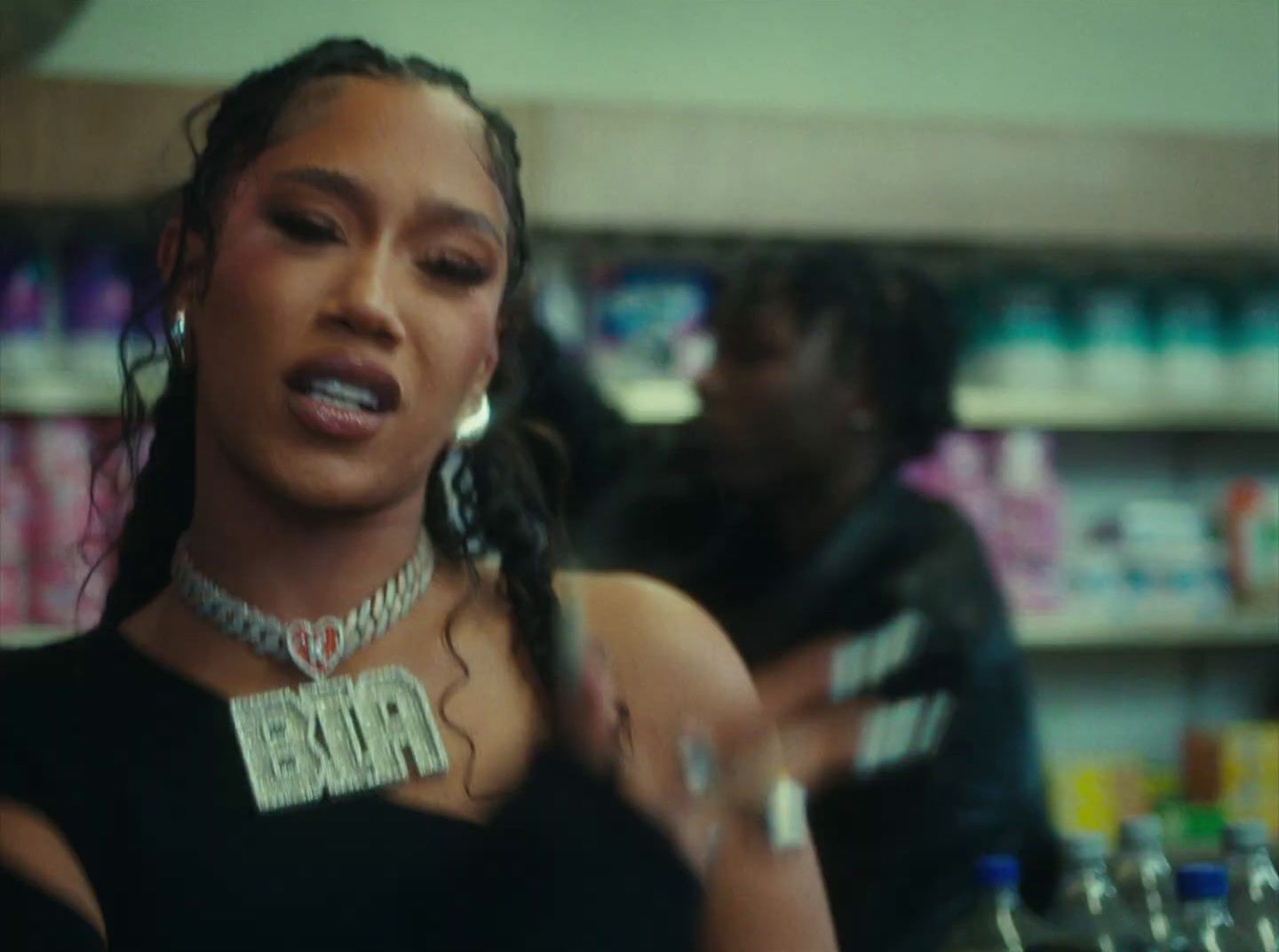 a woman in a store with a necklace on