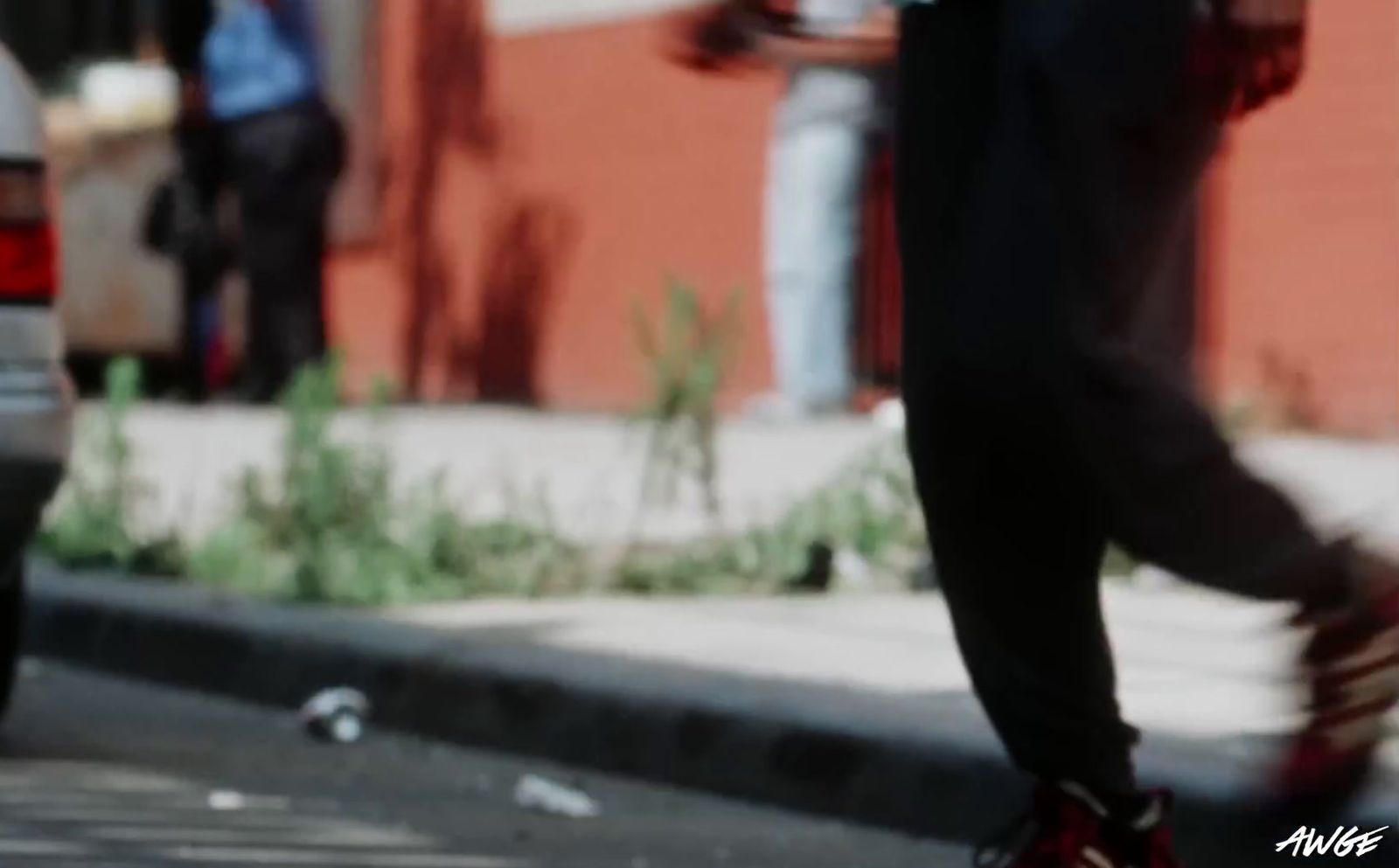 a person riding a skateboard on a city street