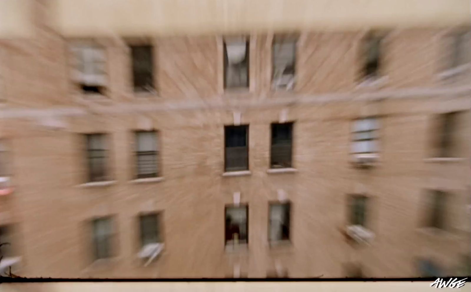 a blurry picture of a building with windows