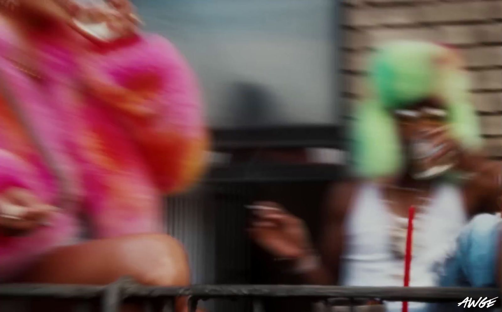 a blurry photo of two women sitting on a bench