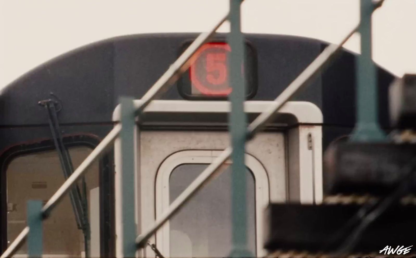 a close up of a train with a red light