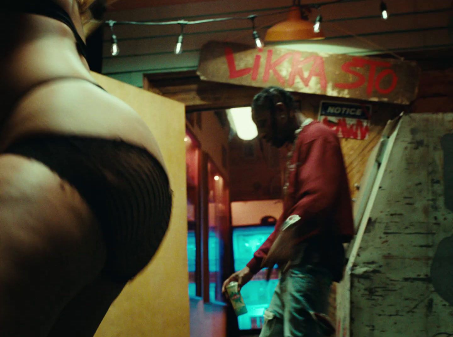 a man standing in front of a store