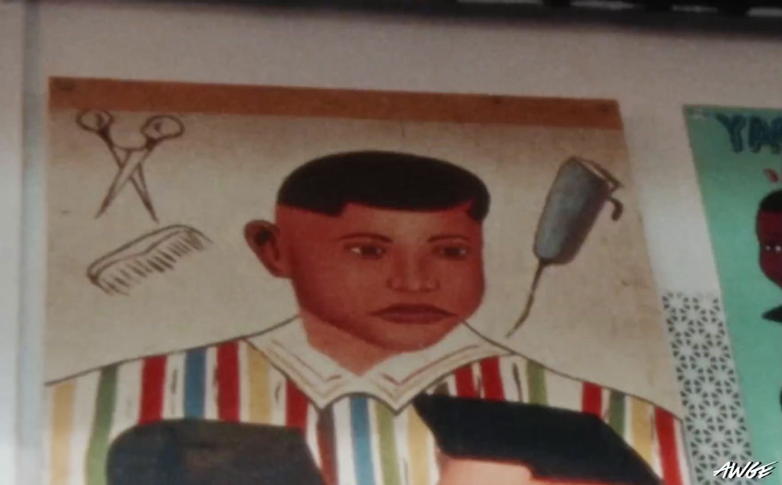 a picture of a young man with a comb and scissors