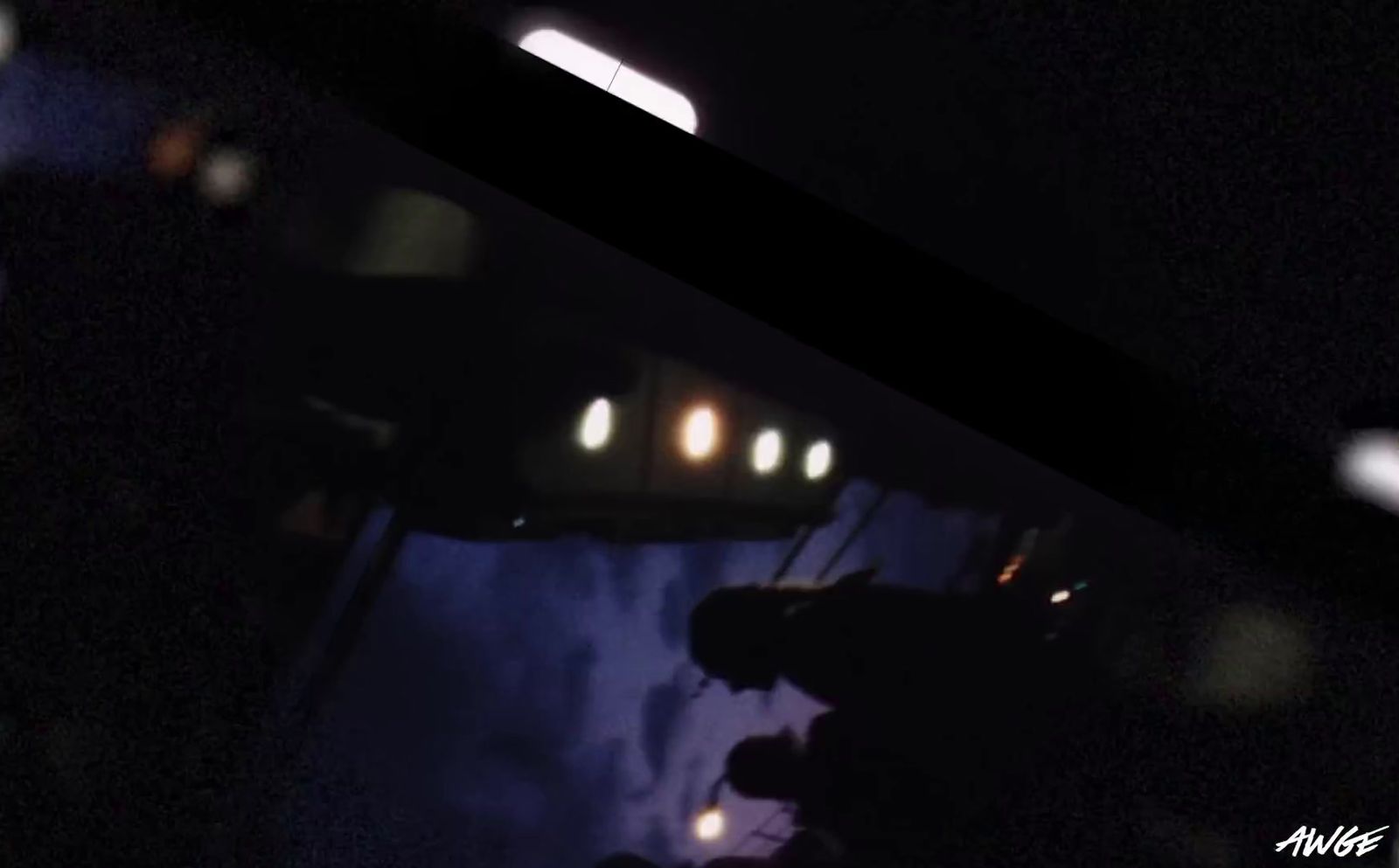 a blurry photo of a bus at night