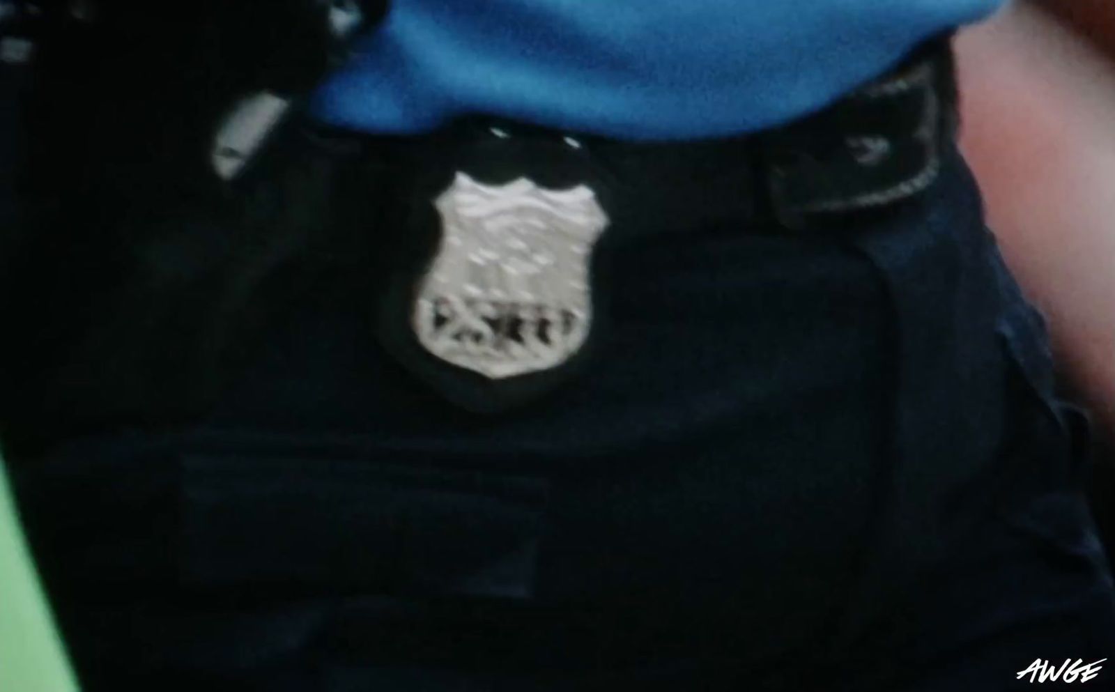 a close up of a person wearing a police uniform