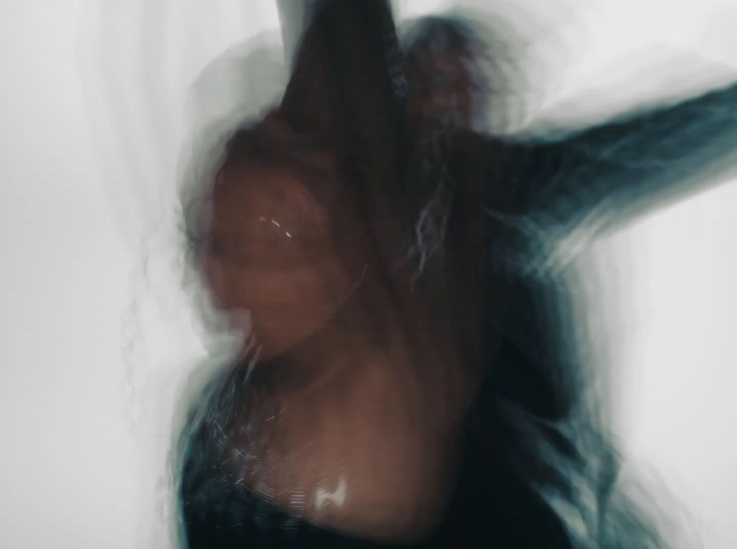 a blurry image of a woman dancing