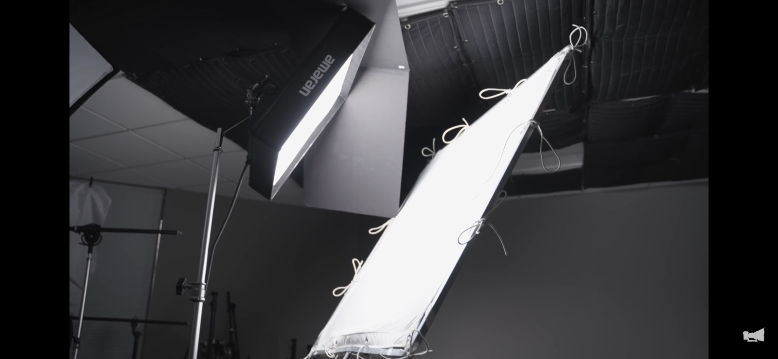 a black and white photo of lighting equipment