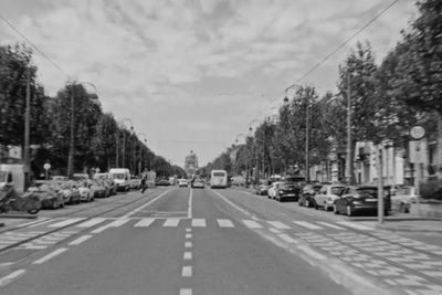 a black and white photo of a city street