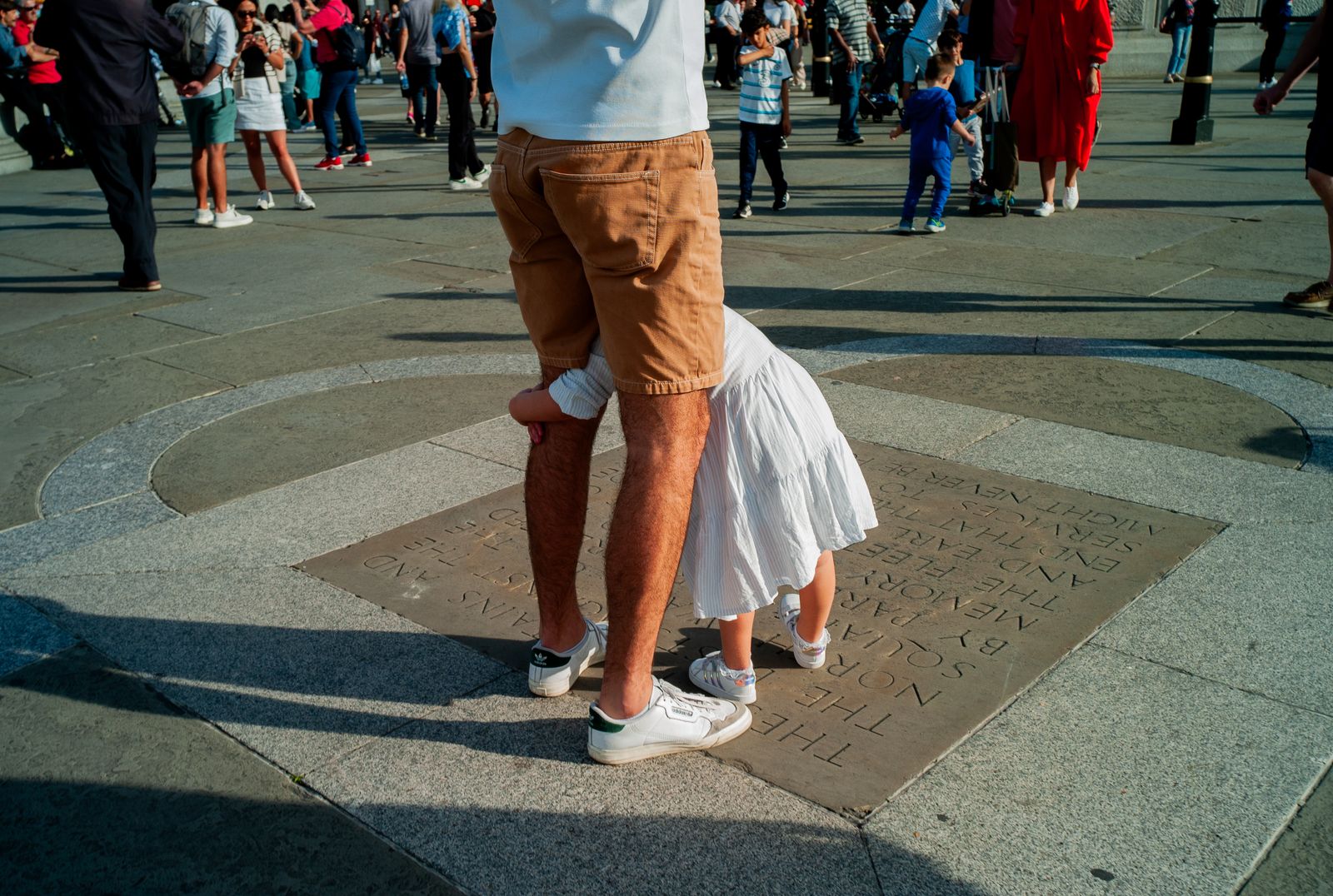 a couple of people that are standing in the street