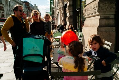 a group of people sitting around a table