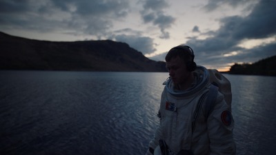 a man standing on a boat in the water