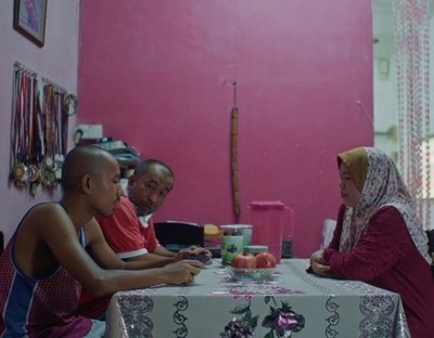 a group of people sitting around a table