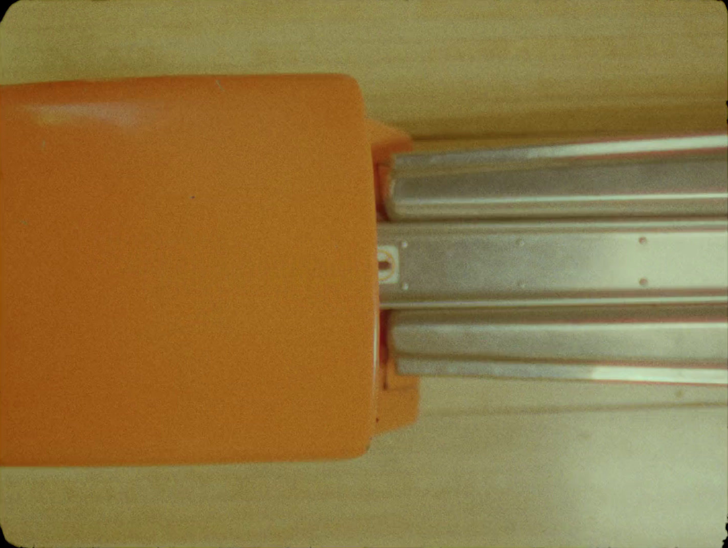 a close up of an orange object on a table